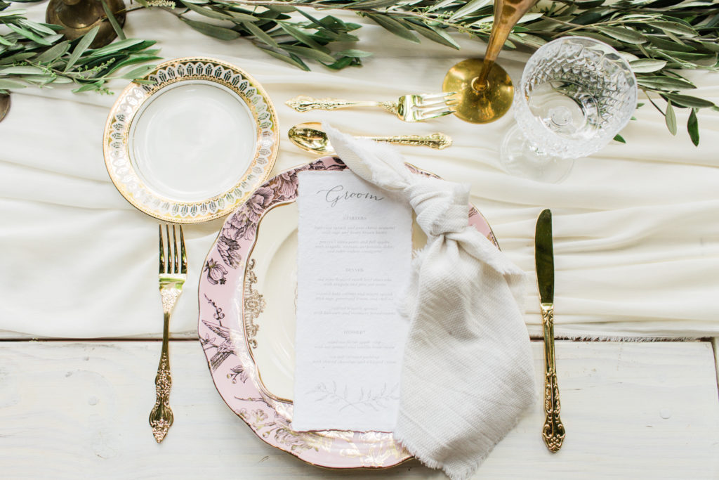 http://loiephotography.com/ Deluxe wedding place setting
