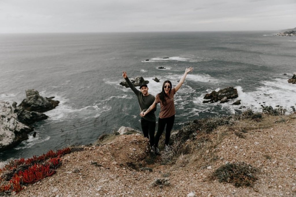 Happy honeymooners surfing